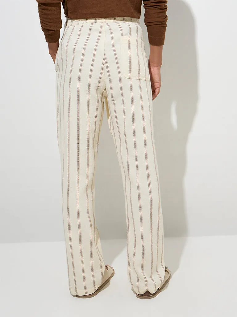 ETA Off-White Stripe Printed Relaxed-Fit Mid-Rise Cotton Chinos